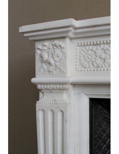 Exceptionally small and refined Neoclassical “Macaron” antique fireplace mantel in pristine Statuario white marble.