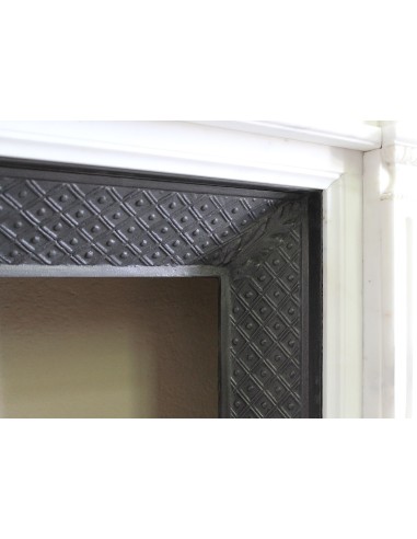 Exceptionally small and refined Neoclassical “Macaron” antique fireplace mantel in pristine Statuario white marble.