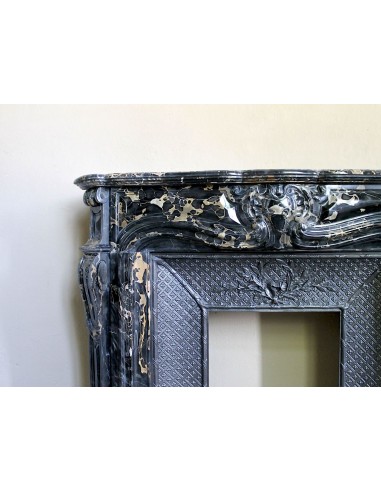 Exceptional Louis XV "Heart" antique fireplace mantel in Black Portoro Gold marble, complete with decorative cast-iron insert.