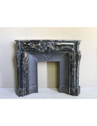 Exceptional Louis XV "Heart" antique fireplace mantel in Black Portoro Gold marble, complete with decorative cast-iron insert.