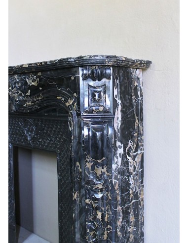 Exceptional Louis XV "Heart" antique fireplace mantel in Black Portoro Gold marble, complete with decorative cast-iron insert.