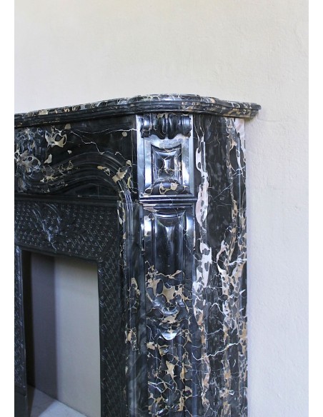 Exceptional Louis XV "Heart" antique fireplace mantel in Black Portoro Gold marble, complete with decorative cast-iron insert.