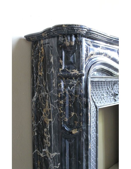 Exceptional Louis XV "Heart" antique fireplace mantel in Black Portoro Gold marble, complete with decorative cast-iron insert.