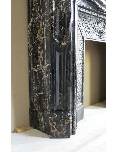 Exceptional Louis XV "Heart" antique fireplace mantel in Black Portoro Gold marble, complete with decorative cast-iron insert.