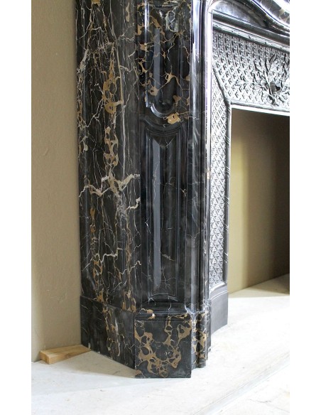 Exceptional Louis XV "Heart" antique fireplace mantel in Black Portoro Gold marble, complete with decorative cast-iron insert.