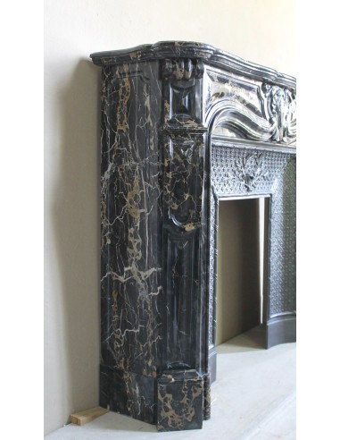 Exceptional Louis XV "Heart" antique fireplace mantel in Black Portoro Gold marble, complete with decorative cast-iron insert.