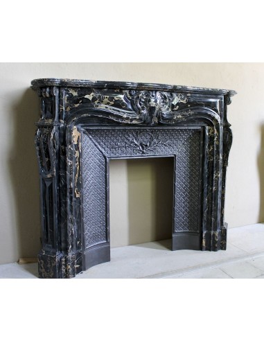 Exceptional Louis XV "Heart" antique fireplace mantel in Black Portoro Gold marble, complete with decorative cast-iron insert.