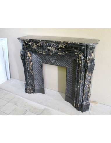 Exceptional Louis XV "Heart" antique fireplace mantel in Black Portoro Gold marble, complete with decorative cast-iron insert.