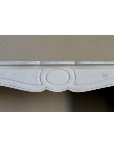 Antique Louis XV "Pompadour Plat" fireplace mantel in White Carrara marble, an iconic example of the classic Parisian style.