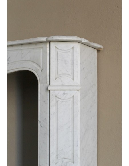 Antique Louis XV "Pompadour Plat" fireplace mantel in White Carrara marble, an iconic example of the classic Parisian style.