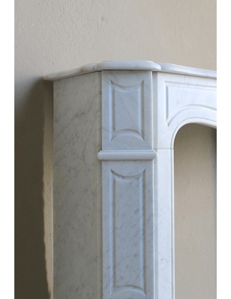 Antique Louis XV "Pompadour Plat" fireplace mantel in White Carrara marble, an iconic example of the classic Parisian style.