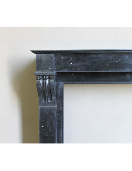 Antique Louis Philippe "Modillon" fireplace mantel in Black Marquina marble, for sale at a low discounted price.
