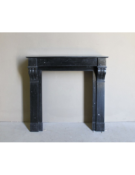 Antique Louis Philippe "Modillon" fireplace mantel in Black Marquina marble, for sale at a low discounted price.