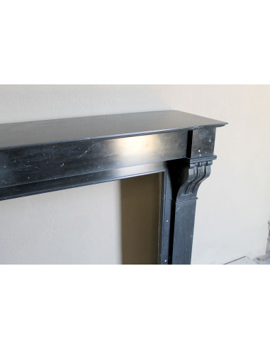 Antique Louis Philippe "Modillon" fireplace mantel in Black Marquina marble, for sale at a low discounted price.