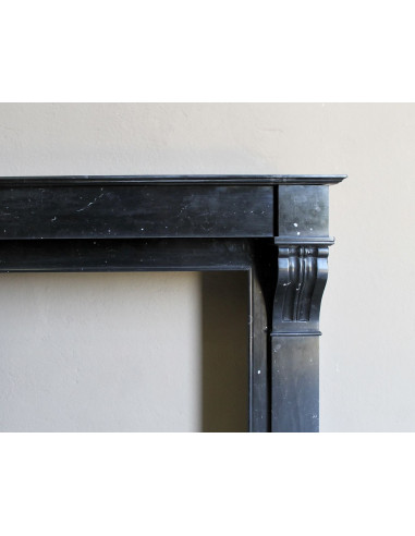 Antique Louis Philippe "Modillon" fireplace mantel in Black Marquina marble, for sale at a low discounted price.
