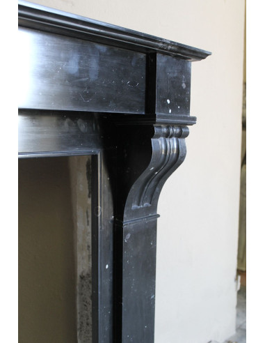 Antique Louis Philippe "Modillon" fireplace mantel in Black Marquina marble, for sale at a low discounted price.