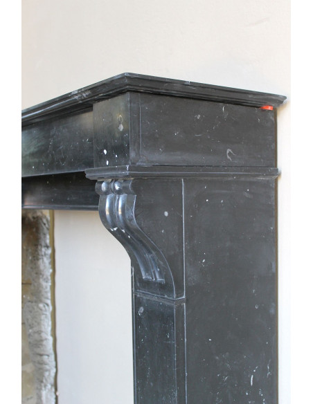 Antique Louis Philippe "Modillon" fireplace mantel in Black Marquina marble, for sale at a low discounted price.