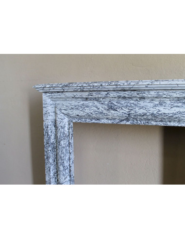 Rare small antique Louis XIV “Boudin Carré” fireplace mantel in elegant grey and blue Bleu Fleuri marble.