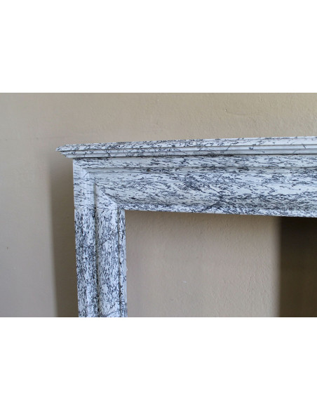 Rare small antique Louis XIV “Boudin Carré” fireplace mantel in elegant grey and blue Bleu Fleuri marble.
