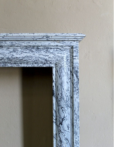 Rare small antique Louis XIV “Boudin Carré” fireplace mantel in elegant grey and blue Bleu Fleuri marble.