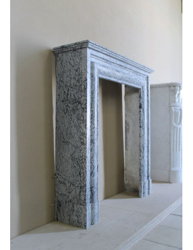Rare small antique Louis XIV “Boudin Carré” fireplace mantel in elegant grey and blue Bleu Fleuri marble.
