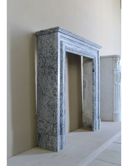 Rare small antique Louis XIV “Boudin Carré” fireplace mantel in elegant grey and blue Bleu Fleuri marble.