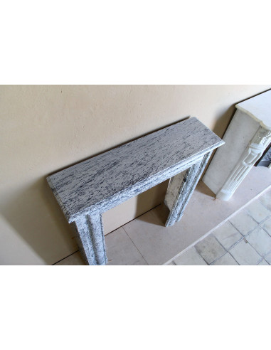 Rare small antique Louis XIV “Boudin Carré” fireplace mantel in elegant grey and blue Bleu Fleuri marble.