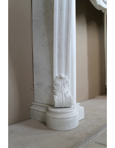 Antique Baroque “Fiorentino” fireplace, finely carved from “Pure” white Carrara marble, with rich floral carvings.