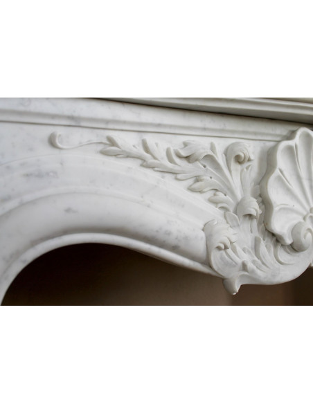 Antique Baroque “Fiorentino” fireplace, finely carved from “Pure” white Carrara marble, with rich floral carvings.