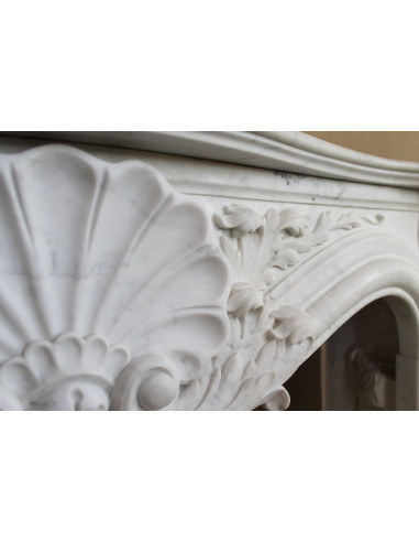 Antique Baroque “Fiorentino” fireplace, finely carved from “Pure” white Carrara marble, with rich floral carvings.