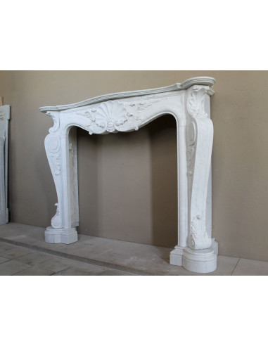 Antique Baroque “Fiorentino” fireplace, finely carved from “Pure” white Carrara marble, with rich floral carvings.