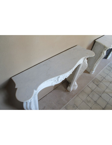 Antique Baroque “Fiorentino” fireplace, finely carved from “Pure” white Carrara marble, with rich floral carvings.