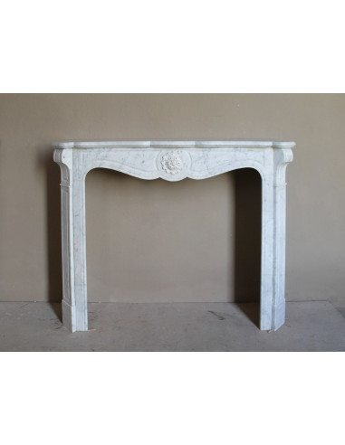 Antique “Pompadour” mantel in white Carrara marble at a discounted price, on sale. A beautiful mantelpiece at a very low price.