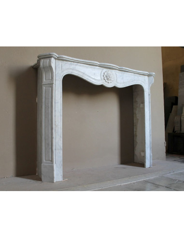 Antique “Pompadour” mantel in white Carrara marble at a discounted price, on sale. A beautiful mantelpiece at a very low price.