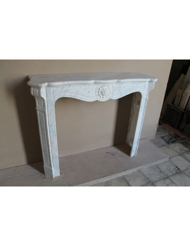 Antique “Pompadour” mantel in white Carrara marble at a discounted price, on sale. A beautiful mantelpiece at a very low price.