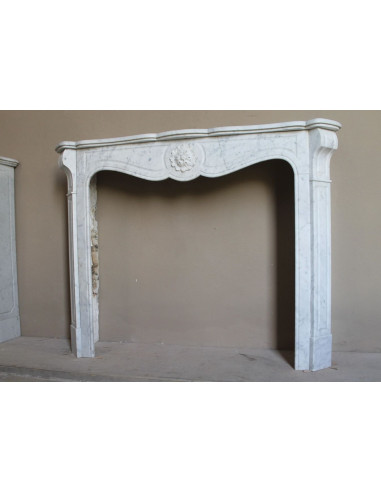 Antique “Pompadour” mantel in white Carrara marble at a discounted price, on sale. A beautiful mantelpiece at a very low price.