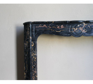 Antique Baroque “Pompadour” fireplace mantel in black Portoro Gold marble, distinguished by its refined gold veining. 2
