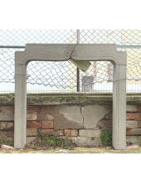 Beautiful and small 20th century fireplace mantel hand carved in Italian "Sarnico" stone at a discounted price