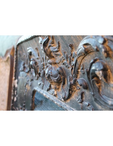 Antique cast iron insert with floral decorations for an antique marble fireplace mantel.