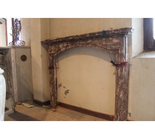 Antique Louis XIV fireplace mantel carved in Red Onyx offered at a very low cost, at a discounted price.
