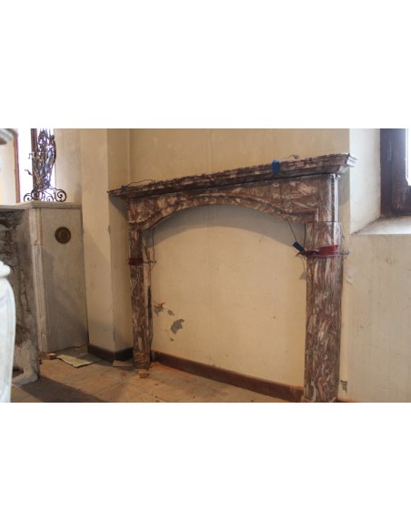 Antique Louis XIV fireplace mantel carved in Red Onyx offered at a very low cost, at a discounted price.