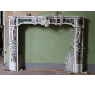 Antique fireplace mantel, in polychrome marble, which was owned by the founder of Autogerma.