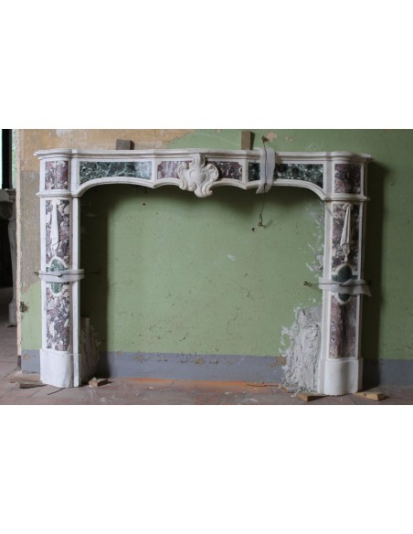 Antique fireplace mantel, in polychrome marble, which was owned by the founder of Autogerma.