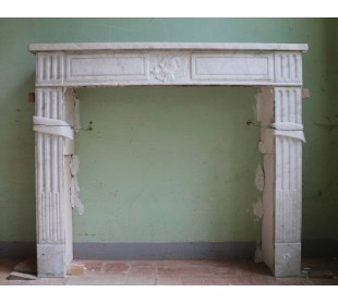Antique Neoclassical white marble fireplace dating back to the last quarter of the 18th century.