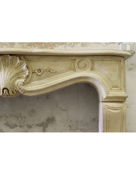 926 VERY RARE, FLORAL AND LOVELY “TRANSITION” FIREPLACE IN PIERRE DORÉE STONE