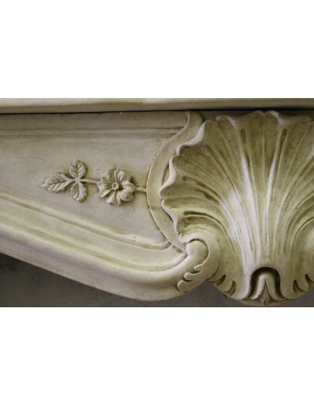926 VERY RARE, FLORAL AND LOVELY “TRANSITION” FIREPLACE IN PIERRE DORÉE STONE