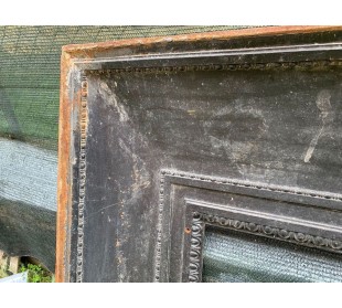 Antique cast iron insert designed to reduce the opening of a marble fireplace mantel. 2
