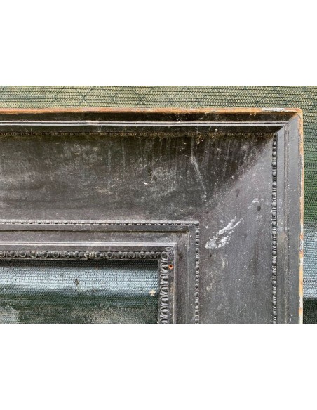 Antique cast iron insert designed to reduce the opening of a marble fireplace mantel.