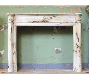 Truly antique Neoclassical Paonazzo marble fireplace dating back to the 19th century.