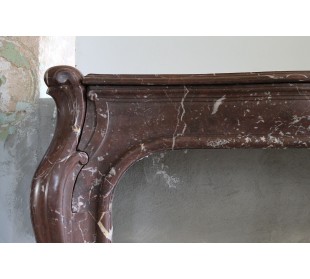 Art Nouveau-style fireplace mantel carved in Rouge Versailles marble. A rare, one-of-a-kind fireplace. 2